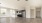 View of kitchen, living room, and hallway