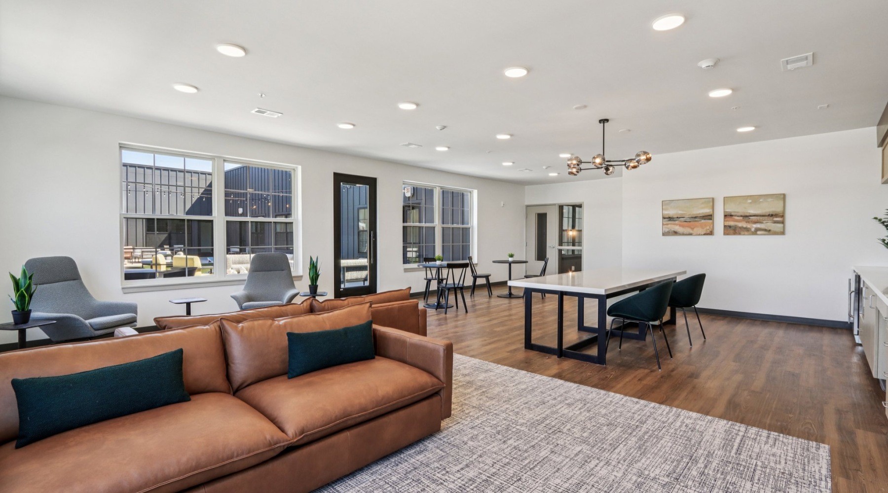 Styled large room with leather couch