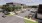 a parking lot with cars and buildings